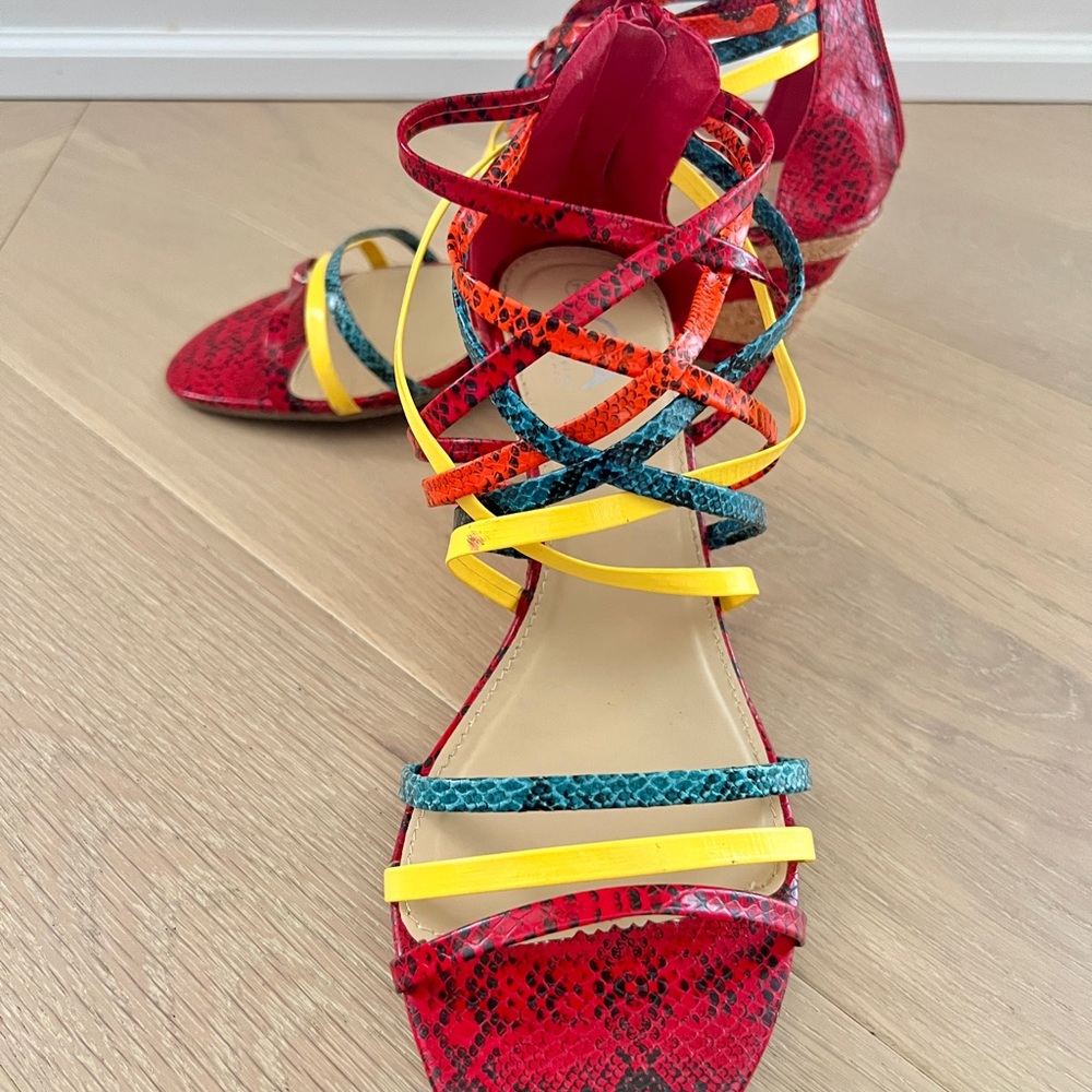 Vibrant Red and Yellow Heels with Bold Design